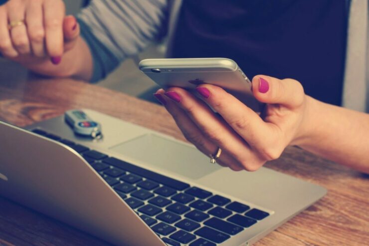 woman holding phone