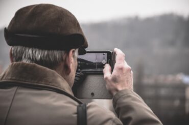 man holding smartphone